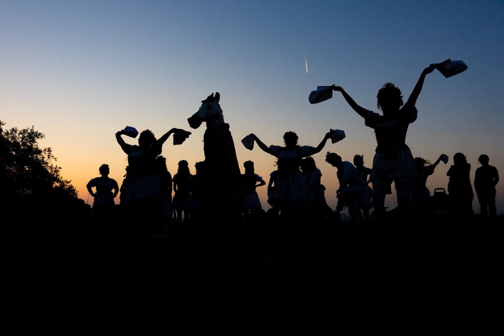 The Belles of London City dance in the sunrise on May Morning, 1 May 2025, Primrose Hill, London
