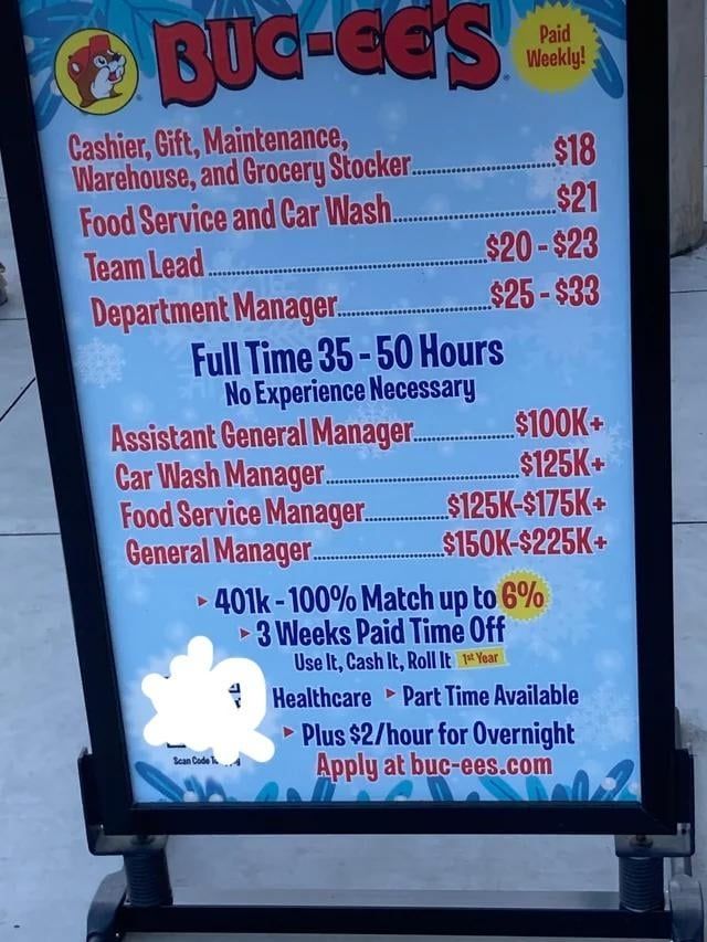Sign advertising buc-ee's salaries, including $125k/year, 3 weeks PTO, 401k match, and healthcare.
