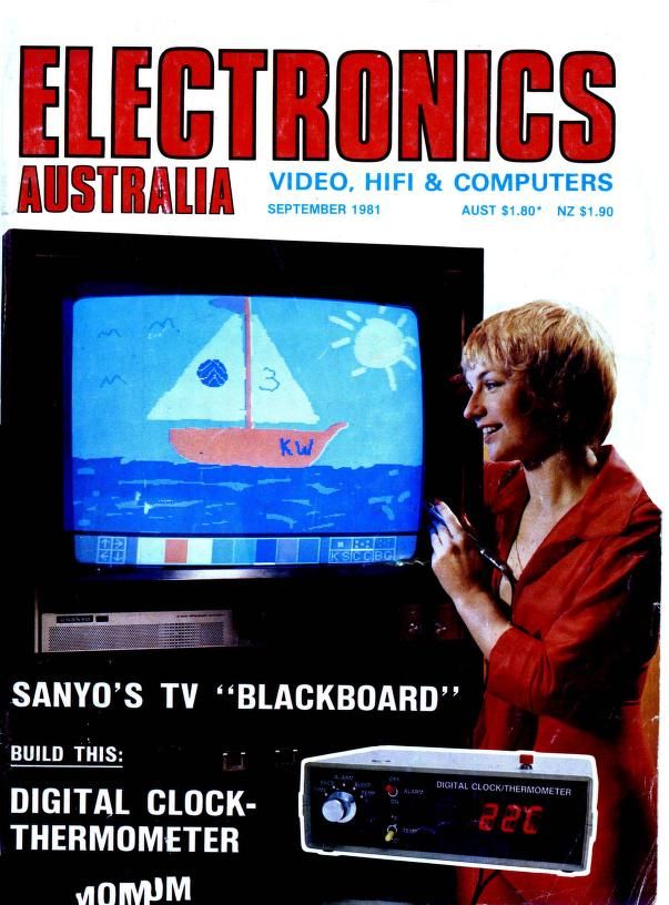 photo on the cover of a woman in red, drawing a graphical doodle of a sail boat on the sea (user interface down the bottom of the tv screen) on sanyo's tv "blackboard" with a pen.