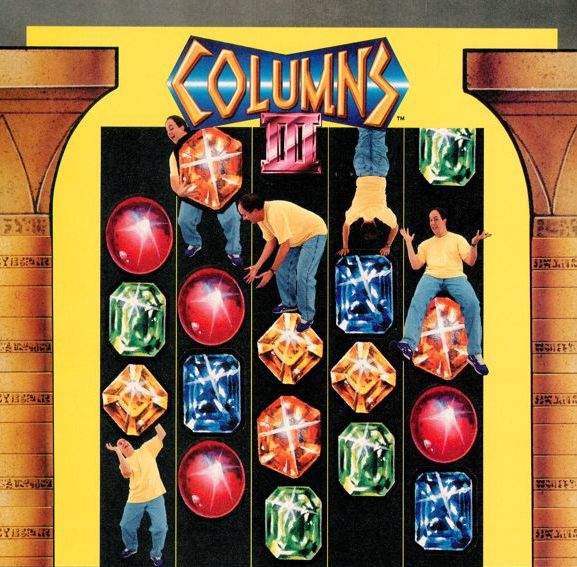 a man in a yellow top and blue pants existing within the game columns. in every column of coloured gems, he is either picking up, sitting on, doing a handstand on or putting his arms up because a gem is falling on him.