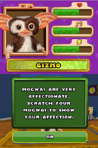 you can see gizmo the mogwai up the top, small creature, brown and white fur, big outwardly pointing ears, large innocent eyes. there are three bars to his right, one with a love heart above it, one with a musical note above it and one with a lightning symbol above it. text on the bottom half:
mogwai are very affectionate. scratch your mogwai to show your affection.