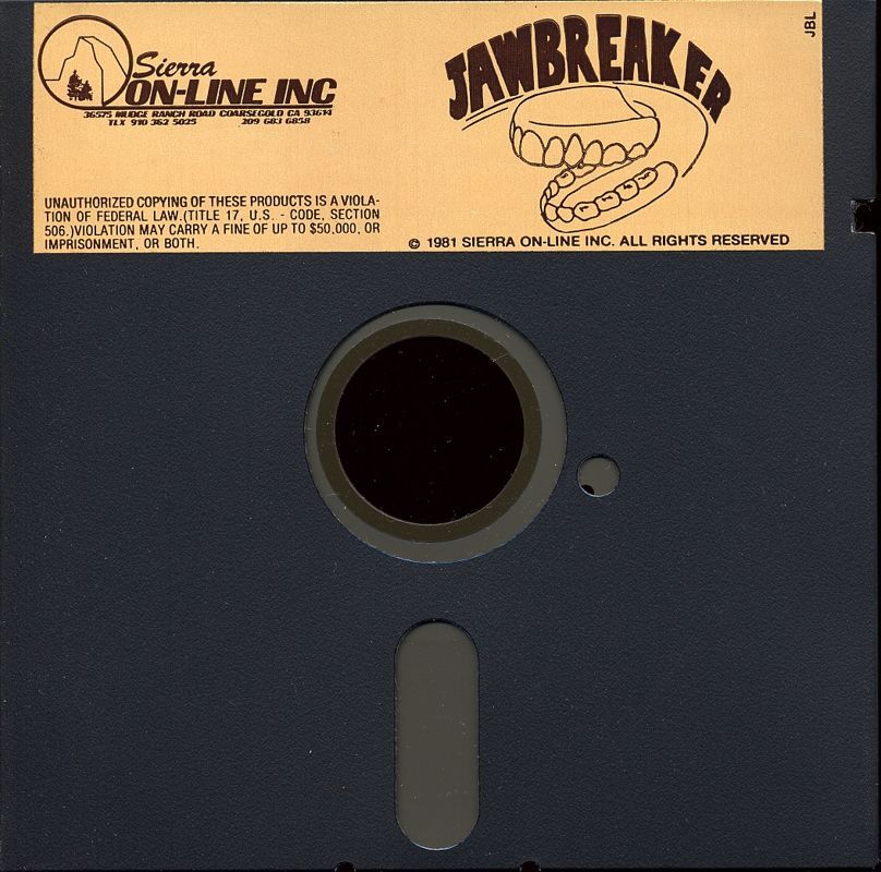 the disk label (light brown) contains an old sierra on-line logo (a rocky mountain with trees at the bottom) on the left and the game title and an illustration of a disembodied set of chompers on the right.
