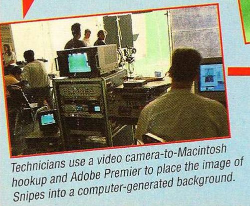 showing the equipment and screens on set that are used to mesh snipes into a computer-generated background.
caption: technicians use a video camera-to-macintosh hookup and adobe premier to place the image of snipes into a computer-generated background.