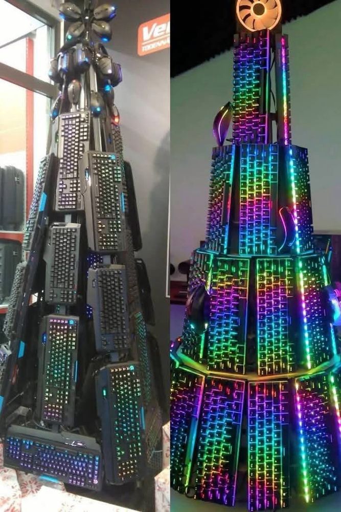 Merry Christmas. This is a Christmas tree made of of computer RGB keyboards. 