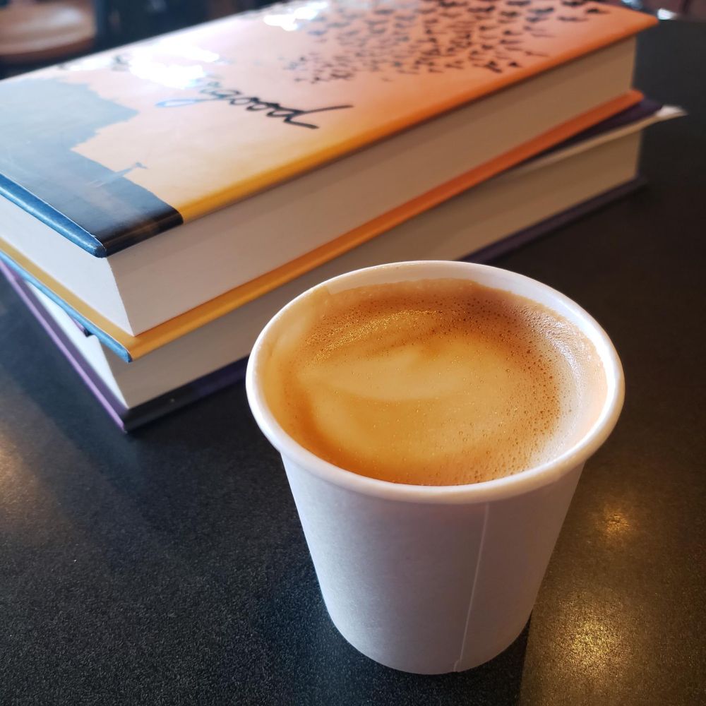 photograph of a coffee and the book SCATTERGOOD by h.m. bouwman
