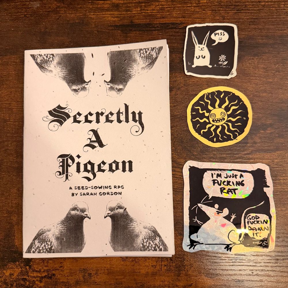 Secretly a Pigeon TTRPG, Piss Rabbit sticker, weird freaky sun, and a shiny rat saying “I’m Just a Fucking Rat! God fucking damn it.”