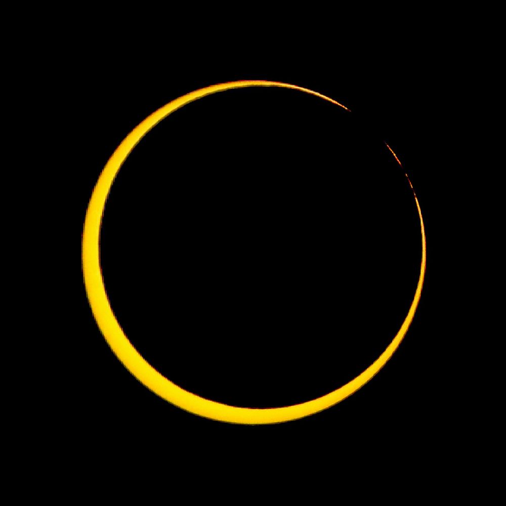 Picture showing the recent ring-of-fire annular eclipse at the point where the lunar disk is right at the edge of the Sun, and the ring is just forming.