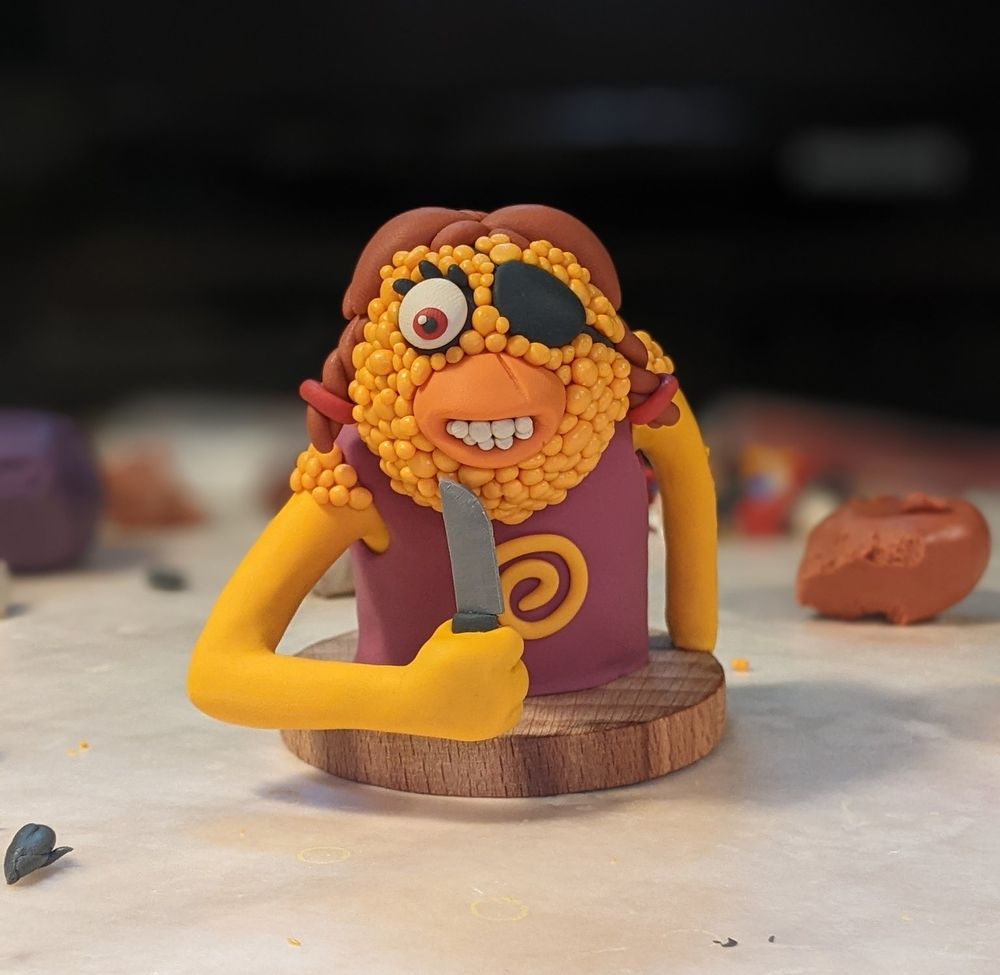 Birdie with a knife.