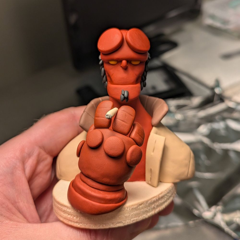Hellboy smoking a cigarette.