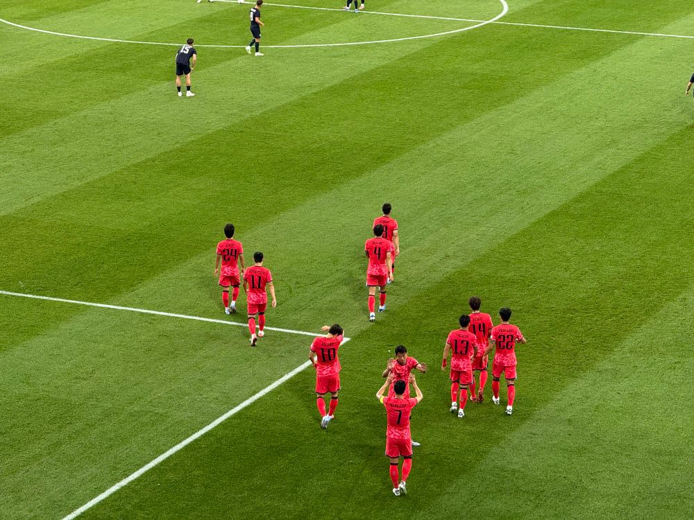 Sonny celebrating a goal with a teammate