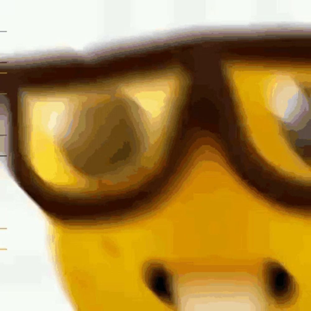 a close up of a pair of glasses with a yellow object in the background