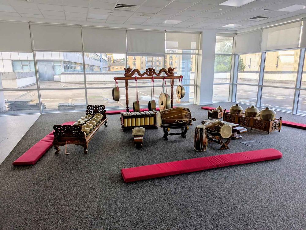 A small Javanese gamelan set in an open plan room