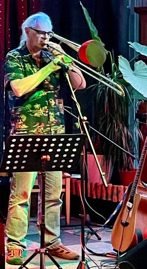 Picture of me playing trombone at an open mic night