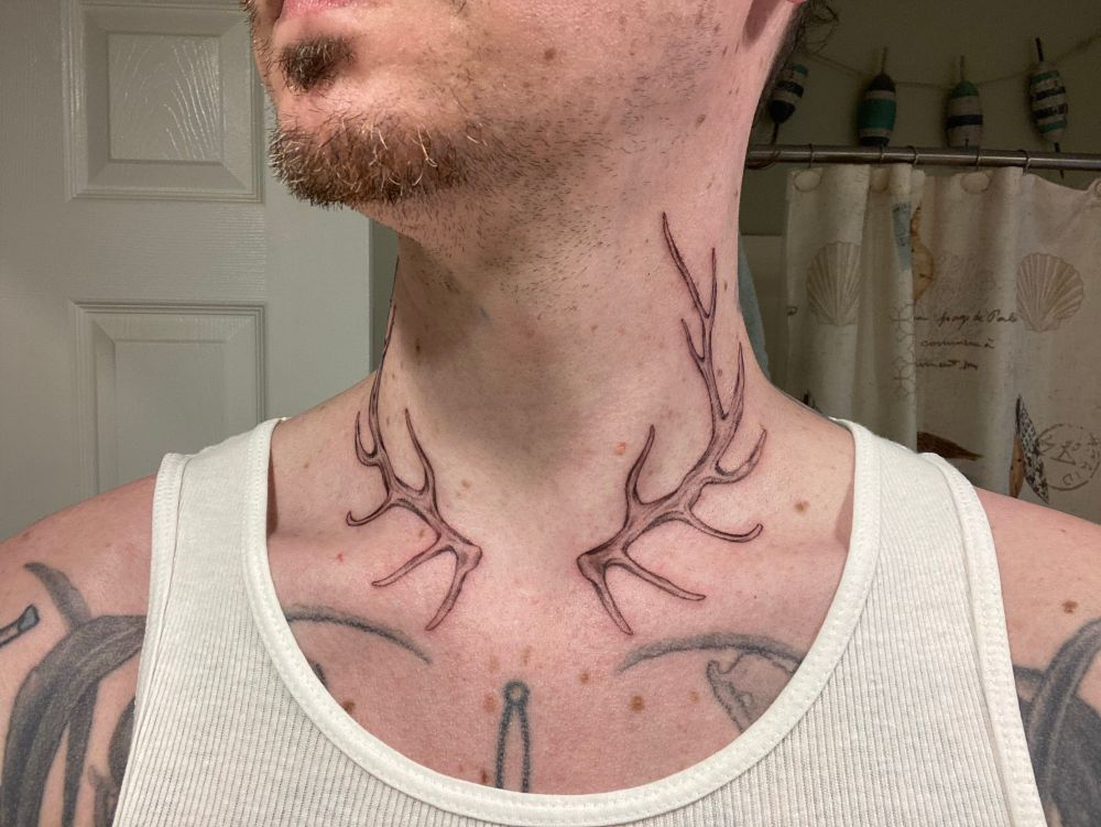 My neck with fresh elk antler tattoos 