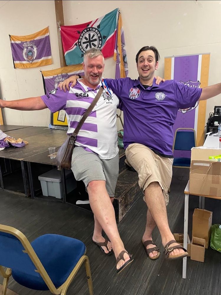 Alex Turner, author of the Advocatus fantasy novel, and myself, author of this thread dancing the can-can with thrudball and squadchaos flags in the background