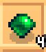 A close up screenshot from Stardew Valley of a green emerald in the light beige inventory square with the number four on the bottom right corner in white font with a black outline