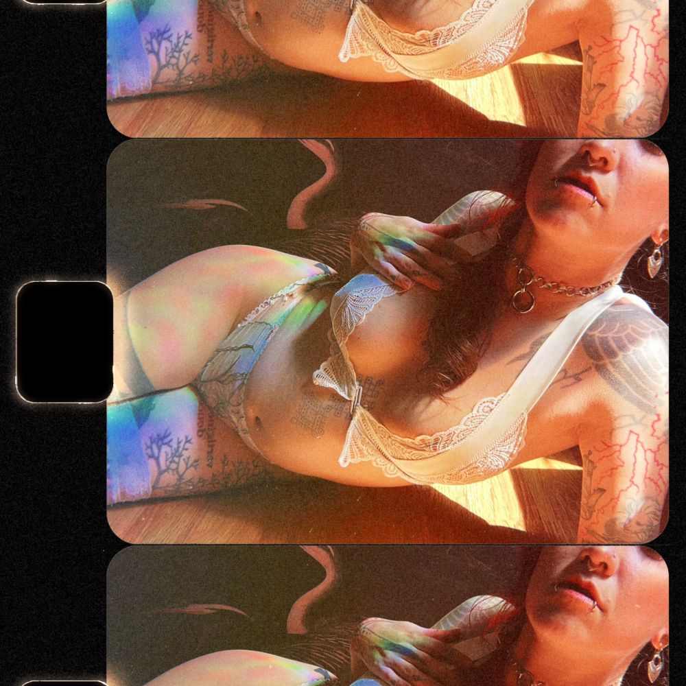 camera roll of tattooed model Urisnae in white lingerie 