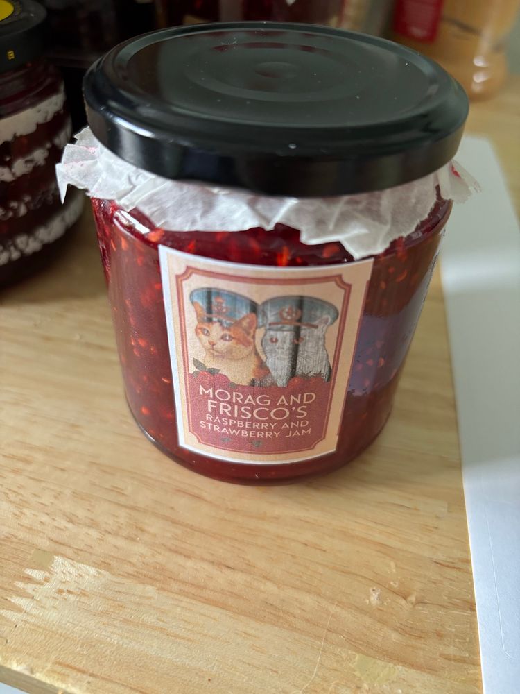 Jam jar with new jam in it