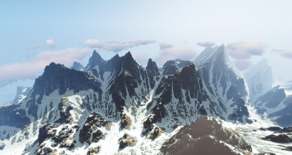 A bird's eye view of a giant, snowy mountain range involving sharp peaks and rocky strata. These mountains are made in Minecraft, but in a world with a 512 block height limit. Picture taken with a shadermod, I cannot remember exactly which