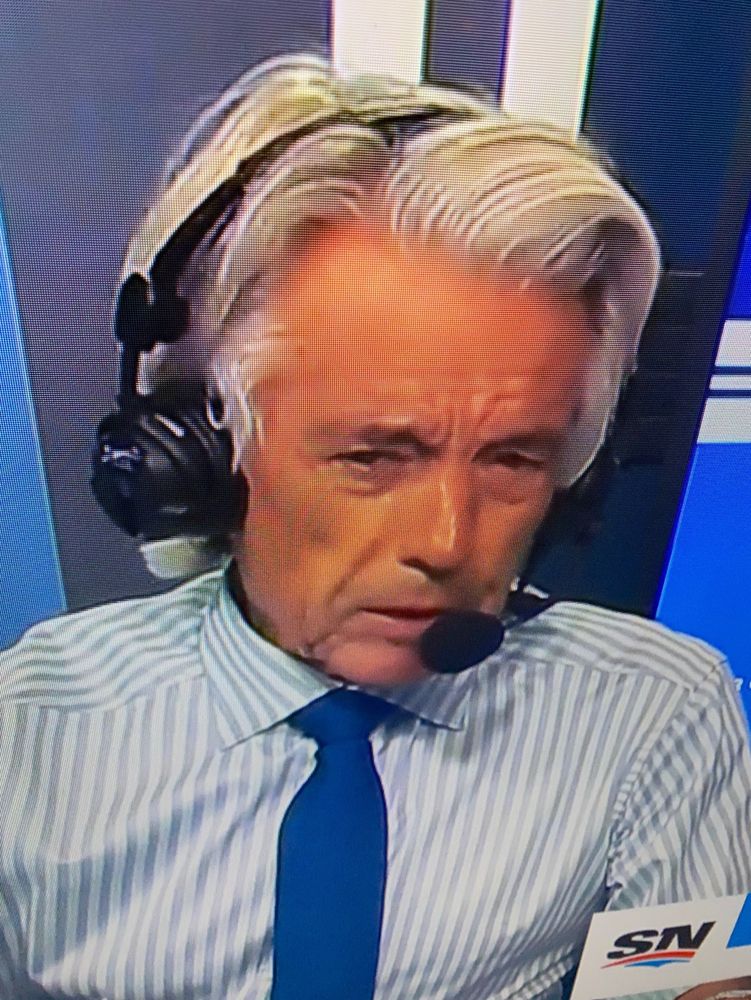 With a mug that says ‘Florida Fox,’ Buck Martinez sports a flowing, wavy mullet before Monday’s game.