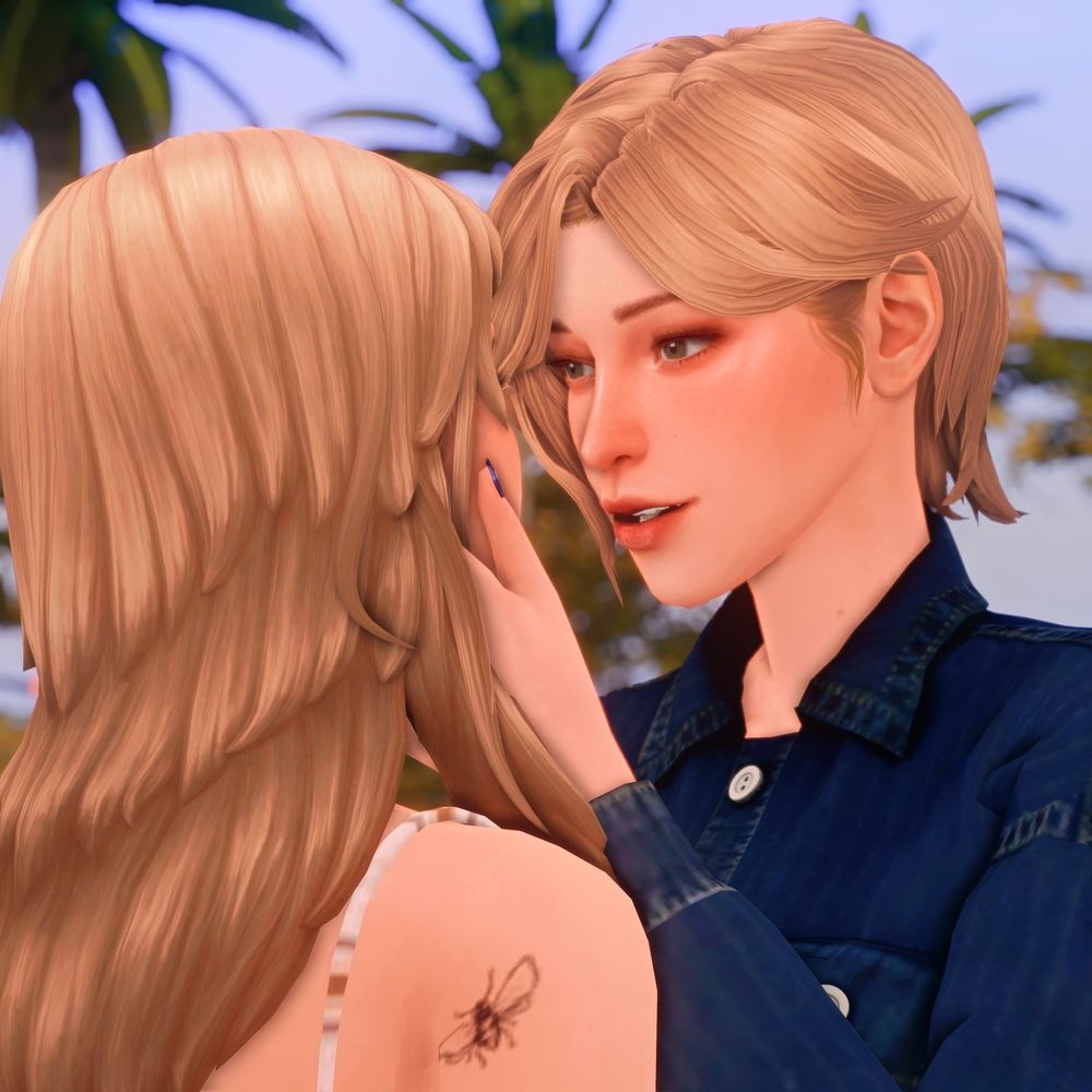 (cont.) a different angle, with Vic smiling down at Kate. A tattoo of a winged insect is visible on Kate's right shoulder.