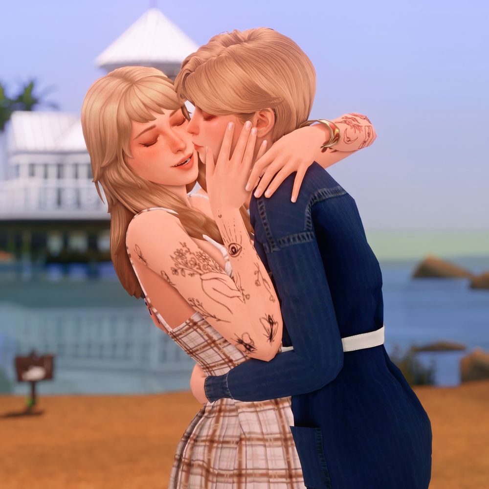 (cont.) Kate and Victoria holding each other close with their eyes closed. Vic's arms around the small of Kate's back, and she's kissing Kate on the cheek. Kate's left arm is around Vic's shoulders, her right hand cupping Vic's left cheek.