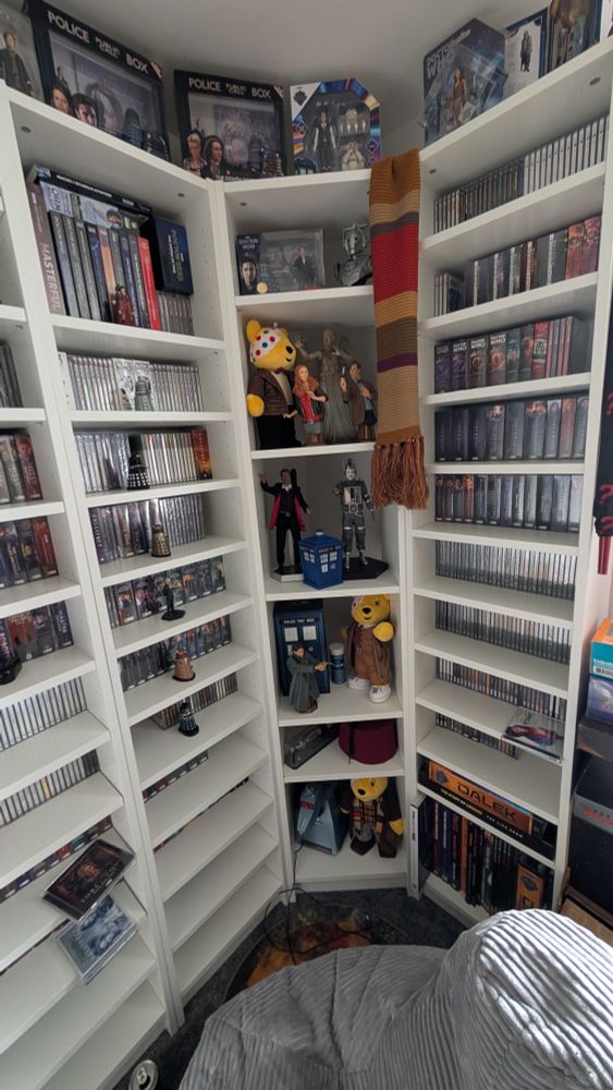 Billy bookcases filled with Big Finish audio CDs and Doctor Who nick naks.