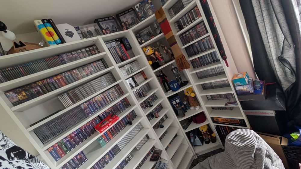 Billy bookcases filled with Big Finish audio CDs and Doctor Who nick naks.