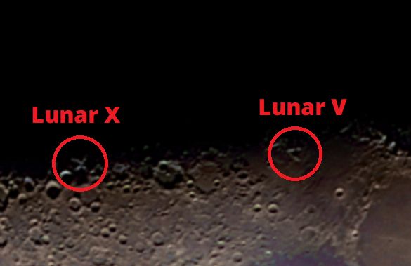 Cropped view of the previous image, zoomed into the area containing the previously mentioned Lunar X and Lunar V, which are circled and labelled. The X is formed from the rims of the craters Blanchinus, La Caille, and Purbach, while the V is formed from the rim of the Ukert crater plus a few small craters that surround it.