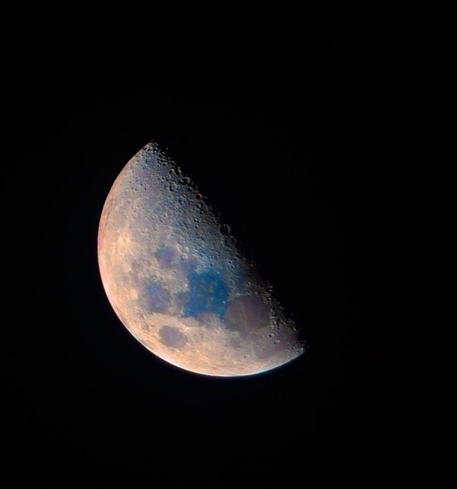 The Moon, approximately half illuminated as seen on the 4th of May, 2025.
The colours have been somewhat enhanced to better display the variability in the Moon's mineral composition, with blue hues hinting at higher concentrations of titanium minerals and redder hues suggesting higher concentrations of iron.
Mare Tranquilitatis is notably bluer than average, while Mare Serenitatis is gently redder.