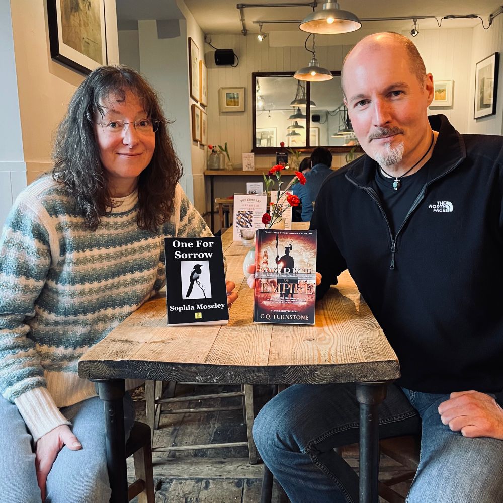 Sophia Moseley with One for Sorrow and C.Q. Turnstone with an author’s proof copy of Avarice of Empire. 
