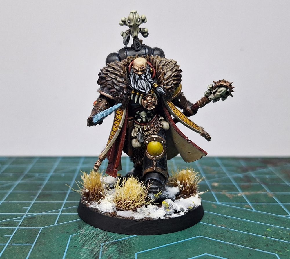 A Wolf Priest of the Spacewolves on a snow-themed base 