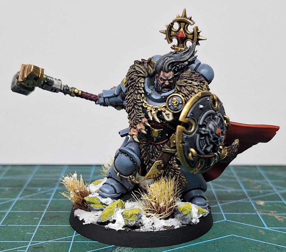 Wolf Guard Battle Leader of the Spacewolves for Warhammer 40k on a snow-themed base 