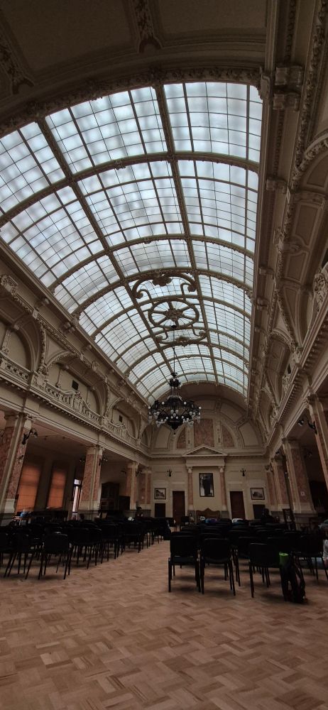 A neoclassical hall with art nouveau glass ceiling 
