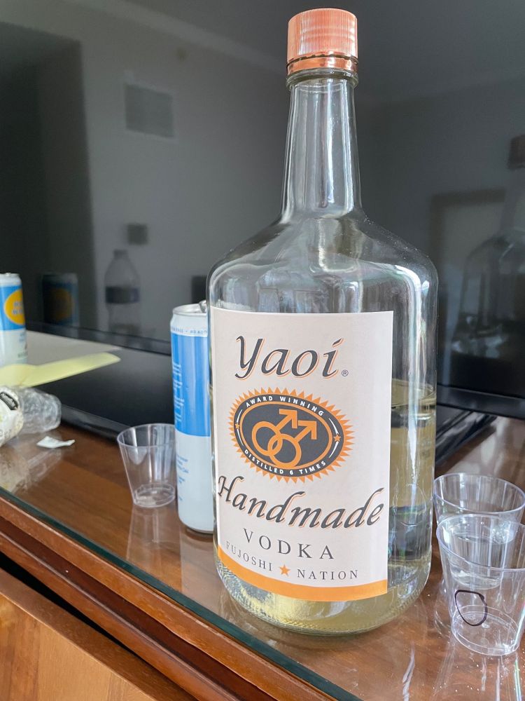 a bottle of vodka that says "yaoi" on it