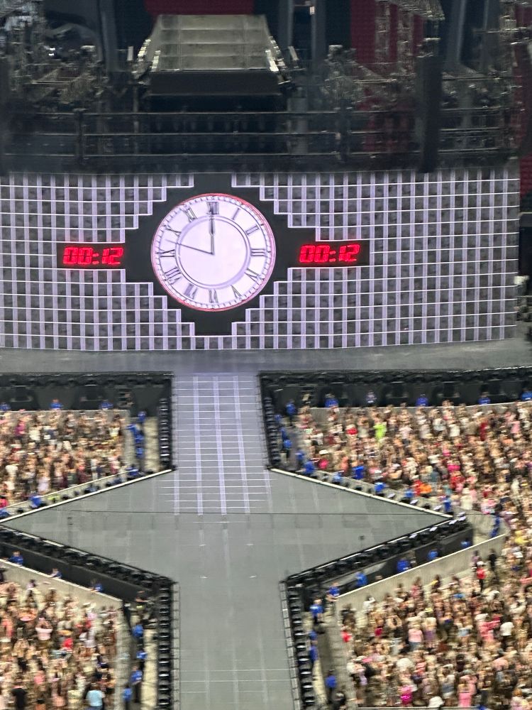 Clock on stage counting down to eras tour start 