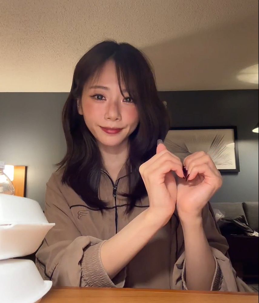 JiU making a heart