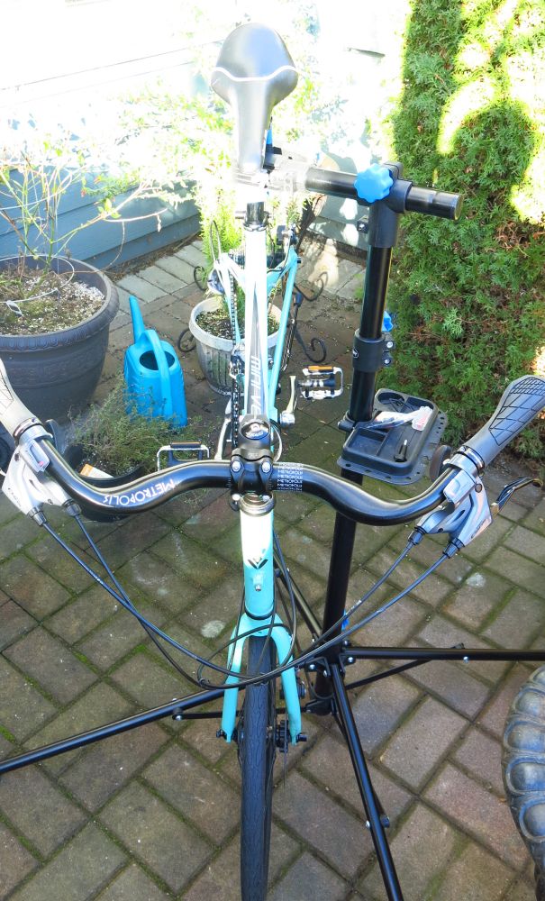 Mini-Velo bike getting new handlebar, shifters & brakes after being converted from drop bar road bike style to a more upright riding position.