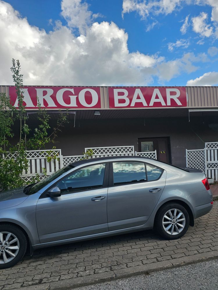 Photo of a sign on a building that says "Argo Baar"