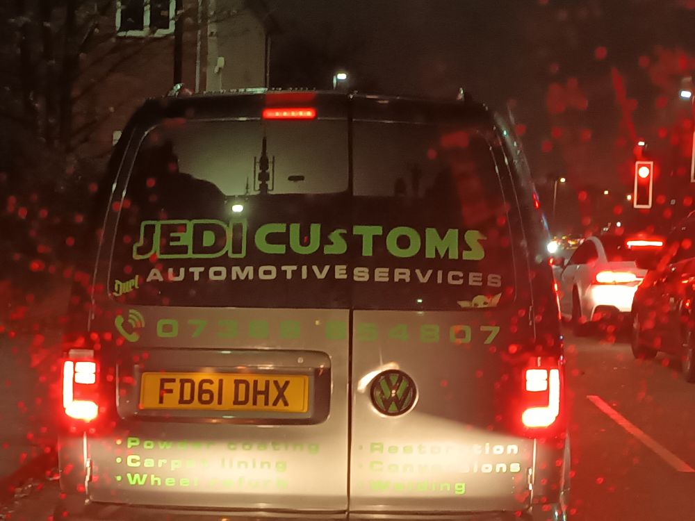 A van saying Jedi Customs 