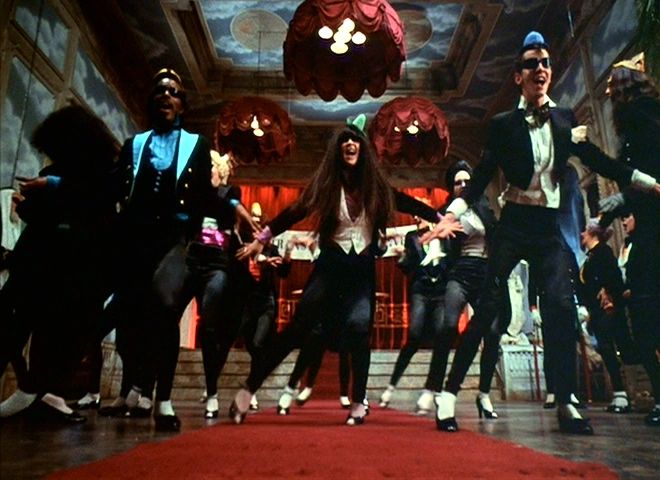 Dancers in The Rocky Horror Picture Show doing the Time Warp