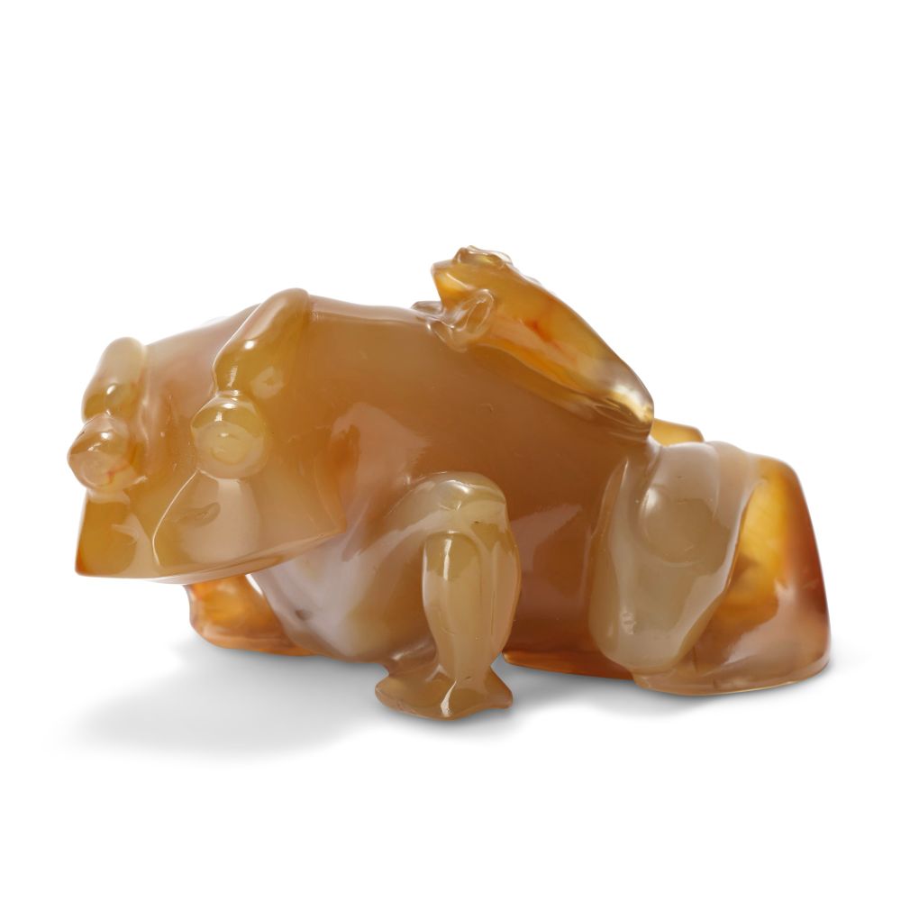 official auction photo 1, side profile on white background
carved orange agate figure of a frog/toad with tiny baby on back
head is carved with bulging round eyes, raised vertical “brows” and odd wide angular jawline, giving it a quirky cool appearance!