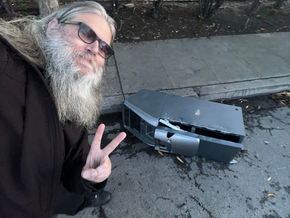 stolen atm that has been broken into and ditched on the street