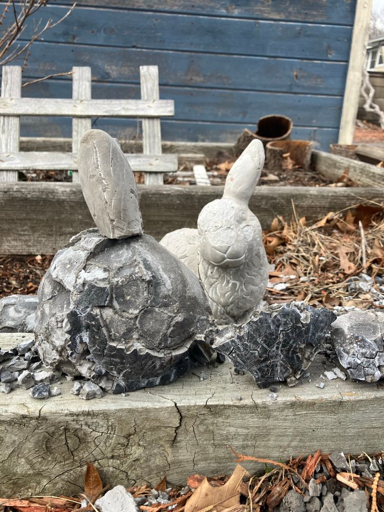 Humorous picture that shows crumbling inexpensive molds of rabbits, breaking up from years of cold and hot weather. The “Harecropolis” instead of the Acropolis 