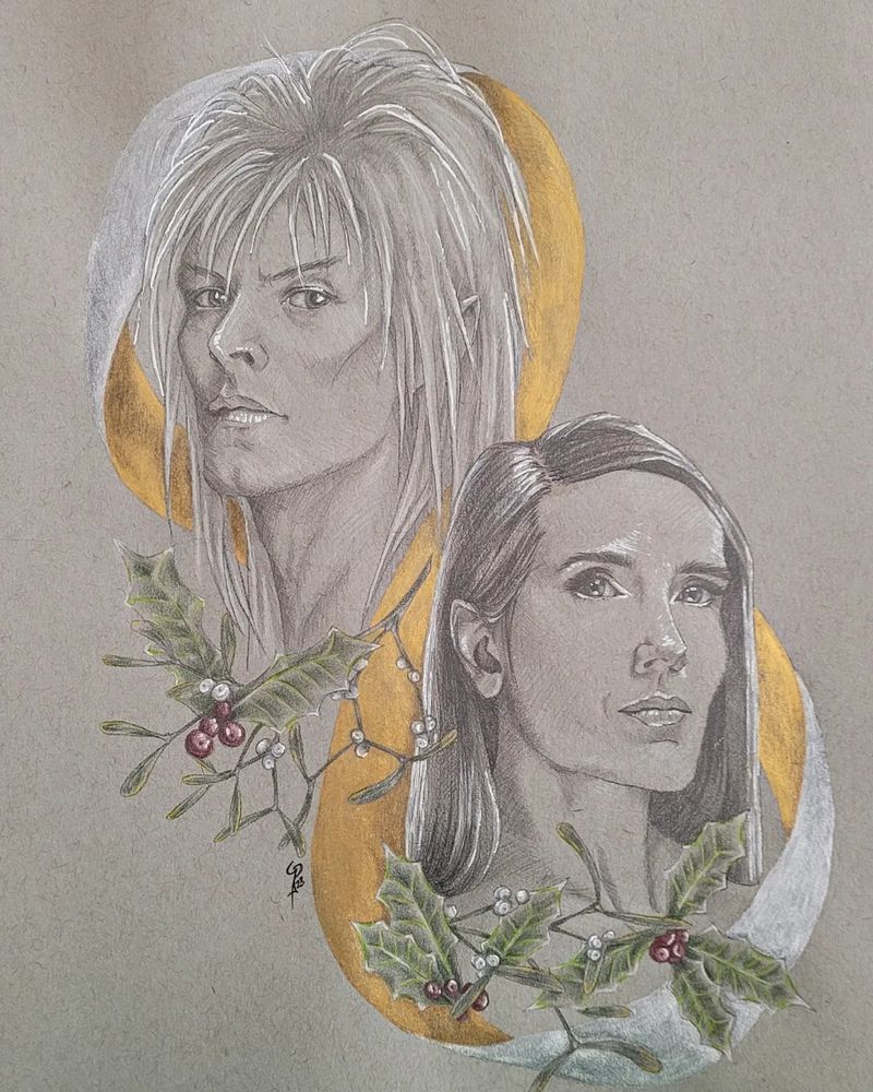 Pencil portraits of David Bowie as Jareth from Labyrinth and an older Jennifer Connelly as Sarah Williams. There is Mistletoe and Holly and a silver-and-gold ribbon