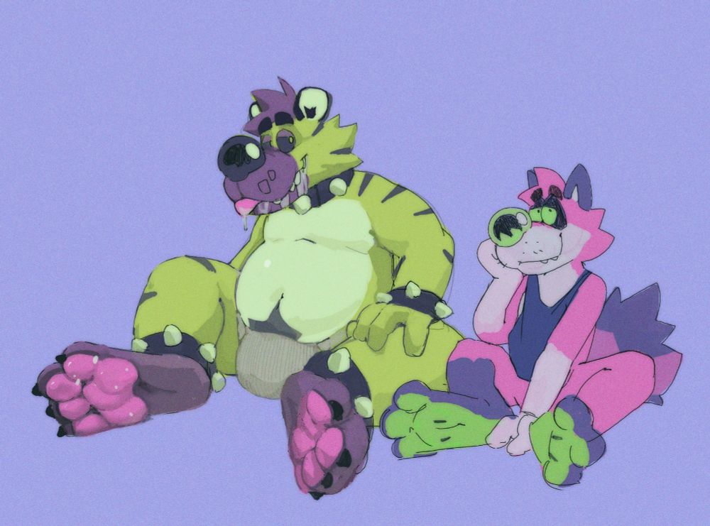 Dvornik the hyena sits next to Moxy the pink ferret