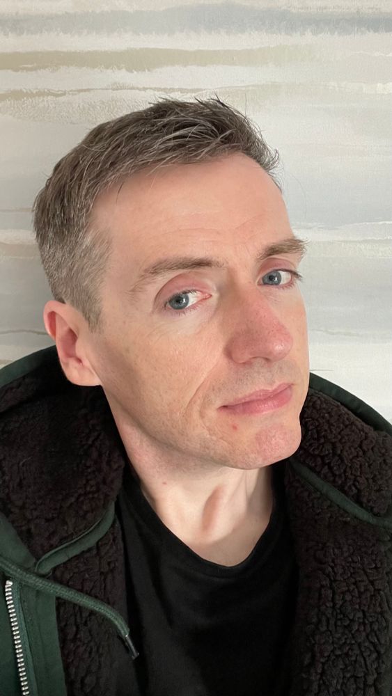 Mike and his spotty face and his short greying hair 