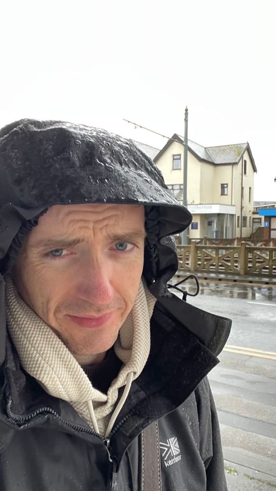 Mike is outside in a raincoat and it’s shit out there pal