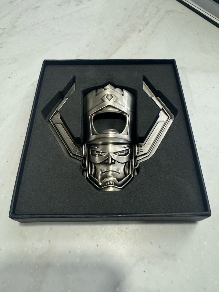 Photo of a chrome bottle opener in the shape of’Galactus’’ head