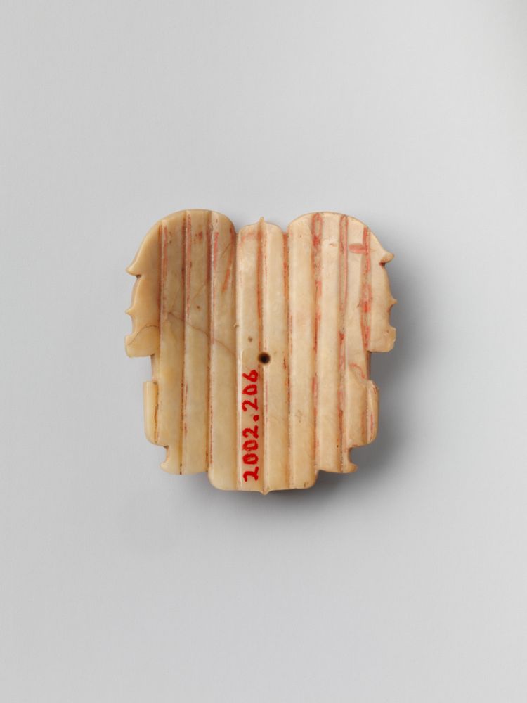 Plaque with mask designs, Metropolitan Museum of Art, New York, NY